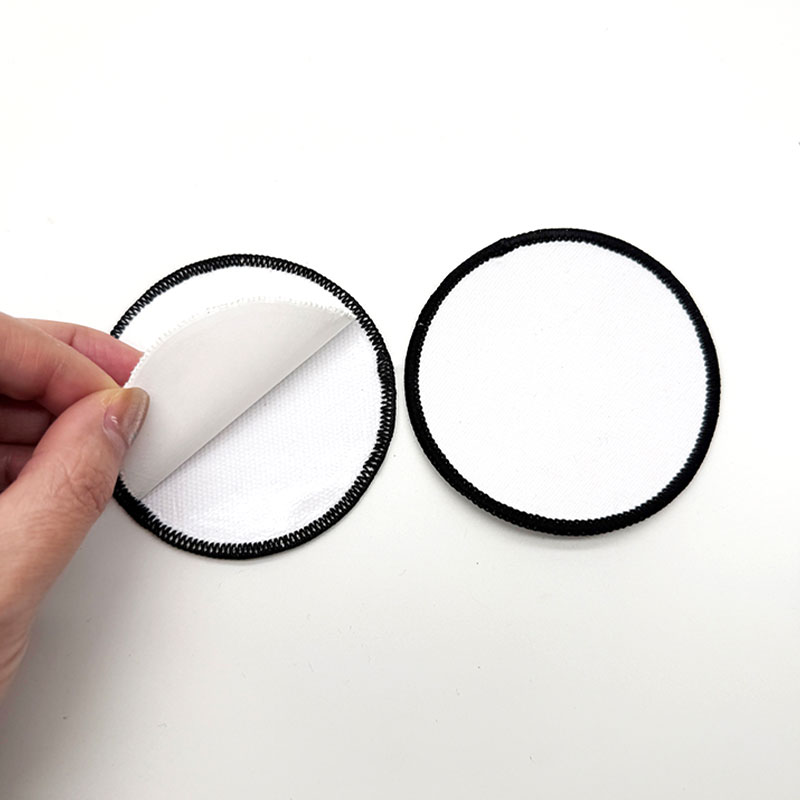 Parche Merrow de tela de sublimación redondo de 2 1/2' con adhesivo