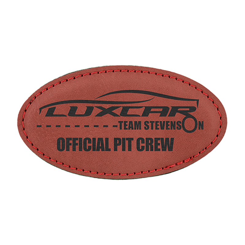 Manta ovalada con insignia de polipiel laserable y imán Manta ovalada con insignia de polipiel laserable y imán